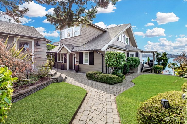 Highly sought after Day Island Waterfront home with 42&#39; (+/-) of waterfront.