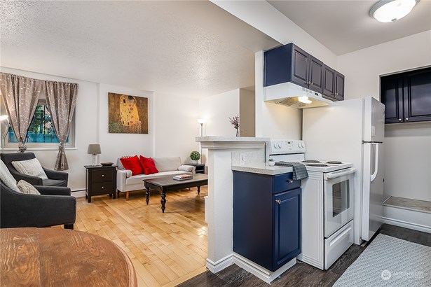 DARLING 2 bedroom condo-home with in-unit laundry hook-ups, hardwood floors (and windows on both sides of the living room) This sweet condo would be a wonderful home OR rental unit! (and it comes furnished!! *with a few decorator exceptions- ask LA for list)