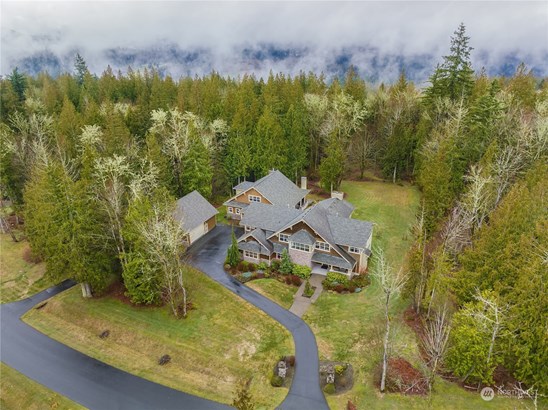 Welcome home to the tranquility of this Northwest inspired retreat. Built on 3 acres. The majestic cedars and lush ferns abound the property creating a beautiful and quiet place to live and enjoy! This is a must see property.