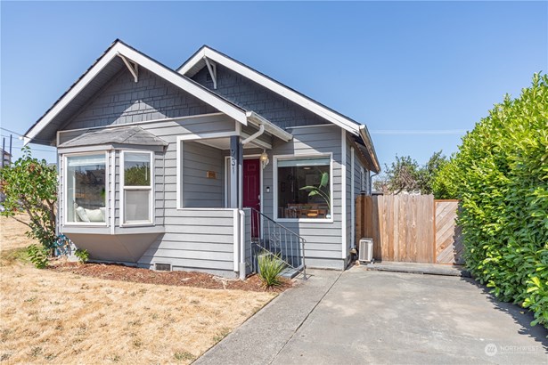 Welcome home to 778 sq ft of charm! 1928 home with upgrades. Gates on both sides of the front.