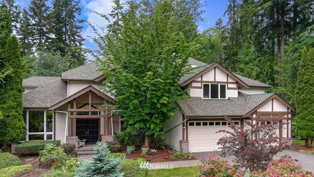 Sought after Lake of the Woods custom remodel on a lush shy acre lot in a quiet cul-de-sac.