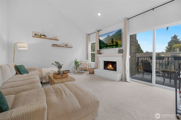 Living room with 20ft vaulted ceilings with tons of natural light