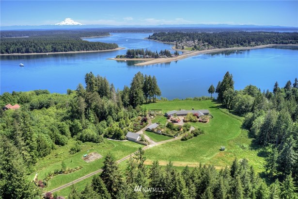 Stunning 30 (+/-) acre waterfront estate offers views of Mt. Rainier, Totten Inlet, Steamboat Island, Hope Island and beyond.