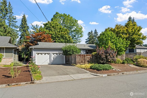 Discover timeless beauty in this stunning  one-level home located in the coveted  Wilburton neighborhood of Bellevue. This  gem is served by award-winning schools.