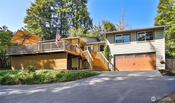 &#34;Step into this beautifully updated home featuring an open floor plan, gleaming hardwood floors, and modern touches throughout.