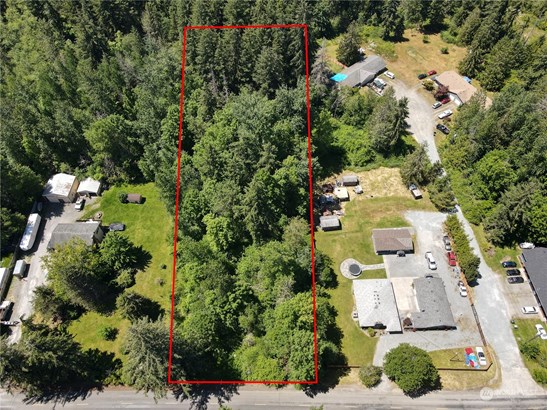 1.98 AC of flat land offering lots of privacy to build your dream home. 149 SQ FT frontage off 58th AVE E, Spanaway, WA Approximately 580 SQ FT deep.