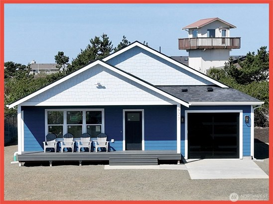 Brand New Bungalow By the Sea! This residence combines contemporary convenience with coastal charm.
