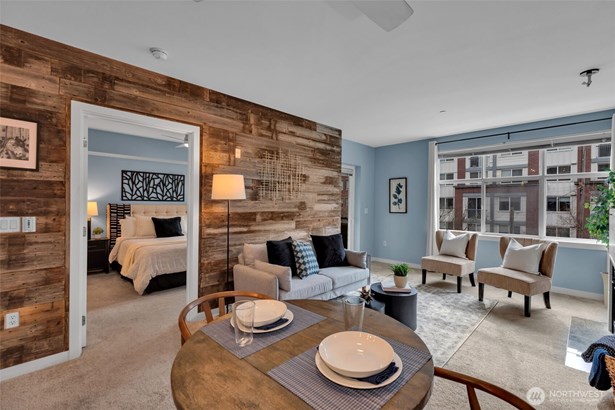 Enjoy living at the premiere Canal Station complex in Historic Ballard. Watch the ships and salmon pass thru the locks, enjoy the sandy beach at Golden Gardens Park, hop on the Burke Gilman trail-great access to the outdoors while in the heart of the city