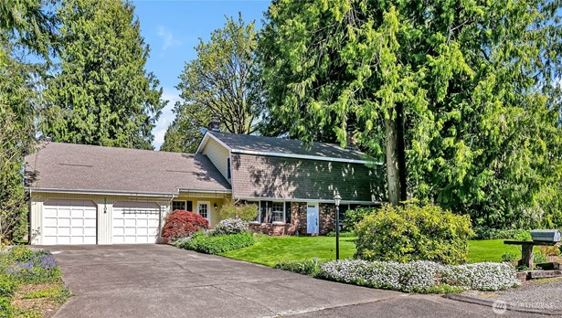 One of a kind custom built home in the original sought after Cedar Downs neighborhood!