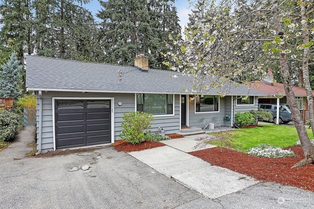 This fully remodeled and light-filled rambler is nestled on a quiet street.