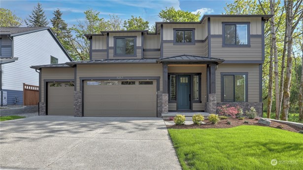 Welcome home to this NW Contemporary home designed by the award wining builder Azure Northwest Homes.