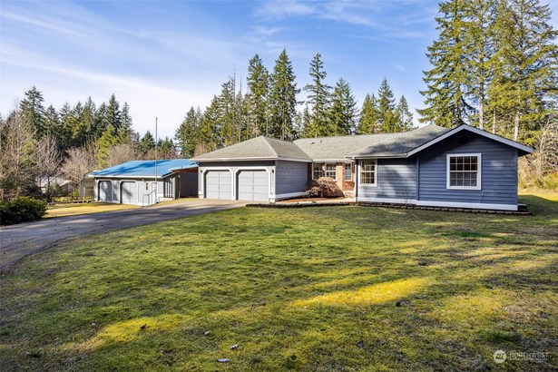 Welcome to your oasis of comfort and space. An expansive property offering a spacious rambler, detached garage/shop, carport, and RV Carport.