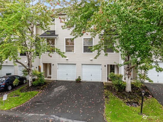 Welcome home! Stop renting and own this lovely townhome with gated entrance. Spacious 2 bed/2.25 bath home with wide plank flooring, gas fireplace, updated trek deck and so much more!