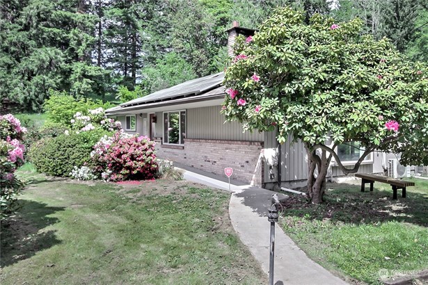 Front view of home, Rhodi&#39;s are in bloom!