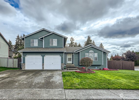 Great floorplan & driveway nicely expanded for 3rd vehicle.