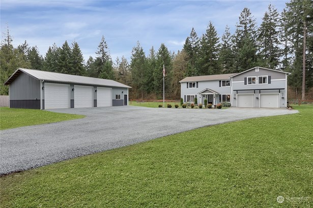 Welcome Home!  5 fully fenced acres with gated entry and 48x30 shop!