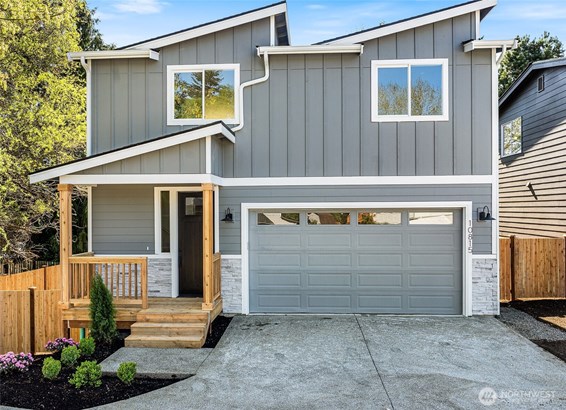 Photo for reference only. Subject property is home to the right  Same sq. ft. similar features.