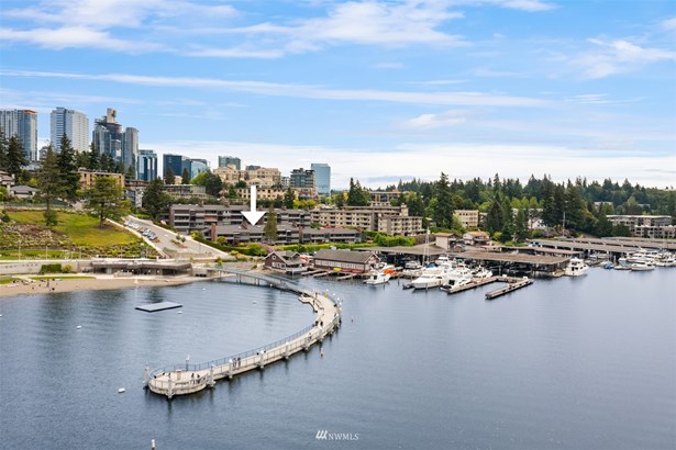 Spectacular waterfront views of Meydenbauer Bay await you from this coveted Whalers Cove residence!
