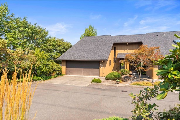 Welcome Home!  Driveway parking and a 2 car garage.