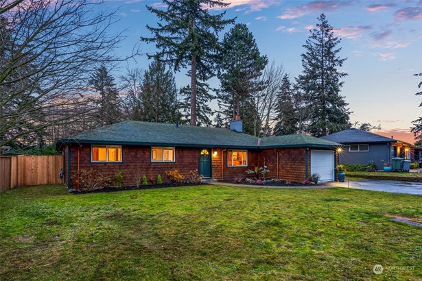 Rare, one level living on flat acreage tucked away in Lake Hills-a coveted neighborhood offering an architectural mix of mid-century ramblers along side new luxury residences