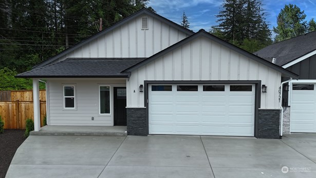 Exterior of Home has covered porch.