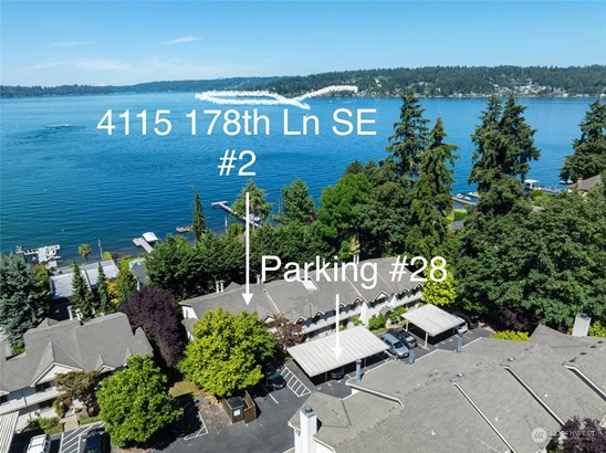 Gorgeous south facing townhome located just one home away from the water. Covered parking spot just steps from the entry door. Plenty of guest parking too!