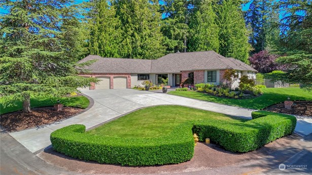 This thoughtfully updated residence offers a spacious open floor plan that seamlessly flows from formal to informal indoor spaces, extending to a fabulous outdoor Lodge-style covered patio.