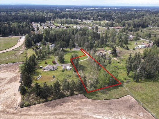 Lot 1 is subject property outlined in red. Lot 2 with house on it, has access easement over lot 1 to get to 227th.