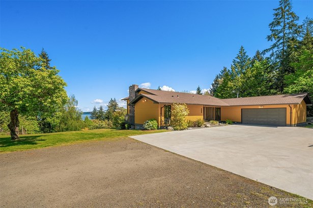 A new concrete parking pad greets you as you drive up to 23322 63rd Avenue SW, or park in the attached 2-car garage. Plenty of room for a half-court hoop game or pickleball! Check out the new roof.