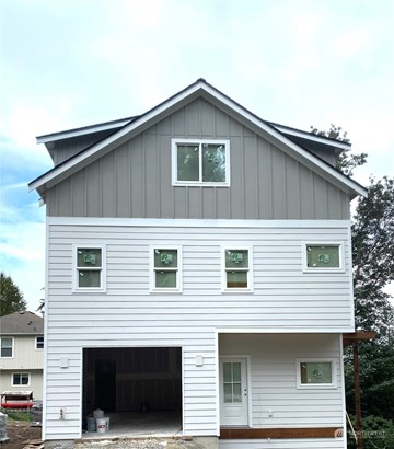 Home is still in the constructions phase. Front deck, Garage door and driveway still to come.