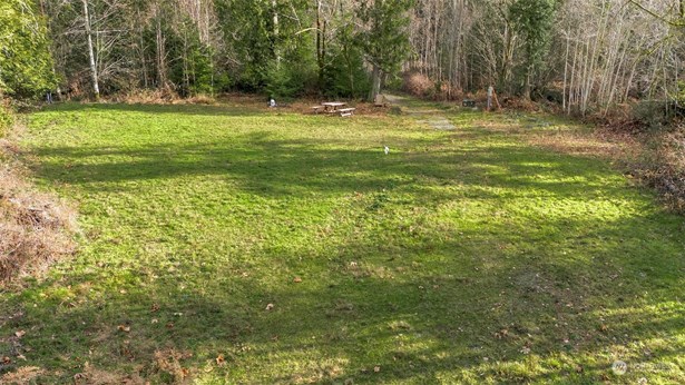 Here&#39;s a partial view of the building site on this 10 acre parcel in Longbranch. Well, power, septic is in and ready for you to build your new home! Or bring in a manufactured home or RV while you work on your plans and securing a builder. You can do a land loan here with utilities on site.