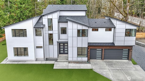 Lot #1 is now fully completed and ready for you to move in! This photo was taken prior to fence and full landscaping were installed. Complete landscaping and fence are now installed.