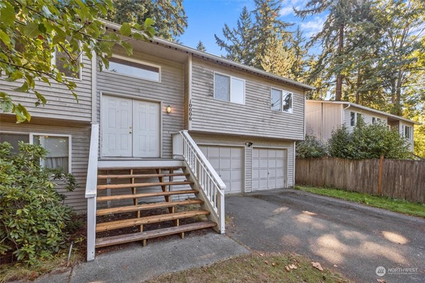 Home faces East. New paint on front door and front deck since photos.