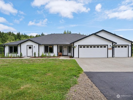 Hard-to-find ONE LEVEL home on acreage in Central Kitsap!