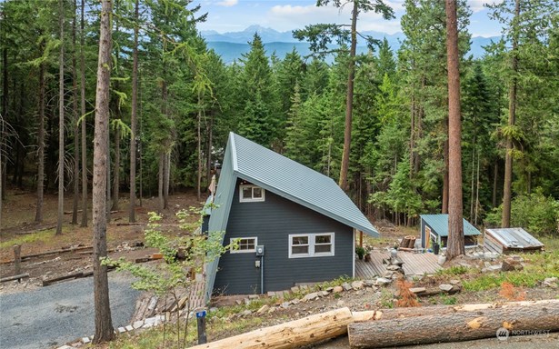 The terraced decks offer beautiful views from every angle and allow for enjoying the sun or shade all day long.  *NEW ROOF *NEW PAINT * FIREWISED AND WIDENING OF THE DRIVEWAY* WEATHERPROOF PLUMBING*