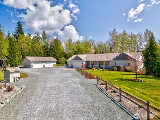 Welcome home to 6951 Woodbury Lane!