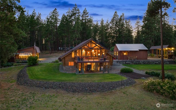 Immaculate log home on 5+ acres.