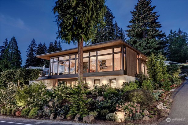 Spectacular custom built modern home with incredible architectural details in the heart of sought after Enatai community