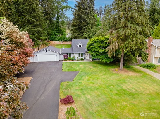 A long driveway leads to this home set back from the street for added privacy.
