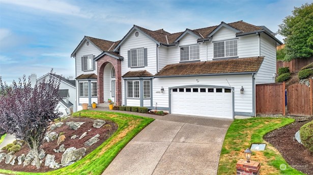 Enjoy the amazing curb appeal and ample parking space.