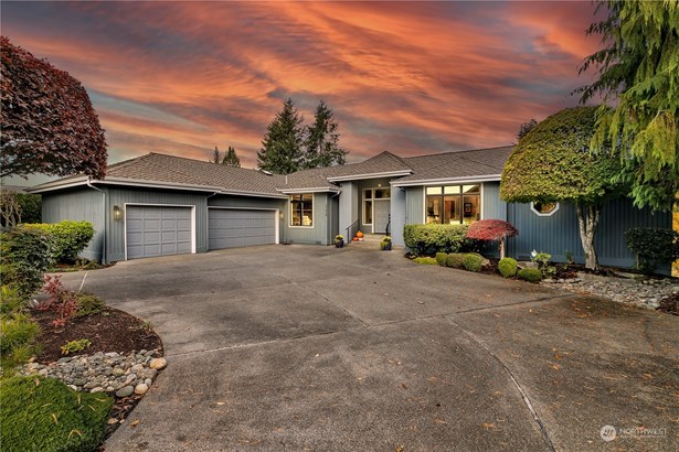 Beautiful home located above the 6th Tee Box.