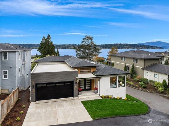 Welcome home to the Modern Lake House! A new construction home with stunning panaromic Lake Sammamish views!