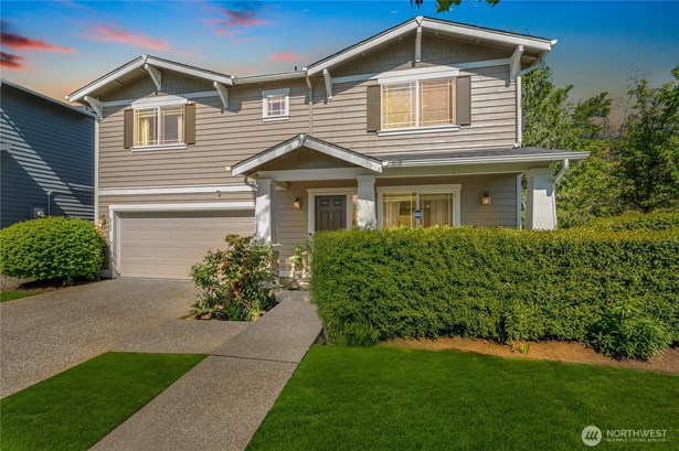 Welcome to this stunning home on a corner lot, featuring fresh exterior paint and charming covered front porch.