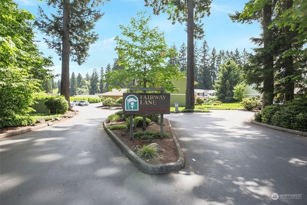 Welcome home! Landscaped Area in front of home is maintained by owners