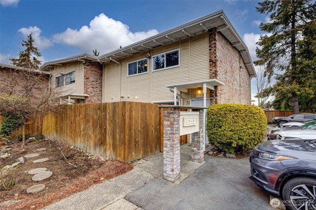 Private fenced patio with convenient gate