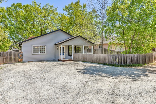 Back corner of a corner lot, fully fenced yard