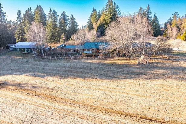 One of the most desirable locations in Whatcom county! Over 21+ acres, 3bed/2.5 bath home with guest suite, 2 large shops and views of Mt Baker!!!
