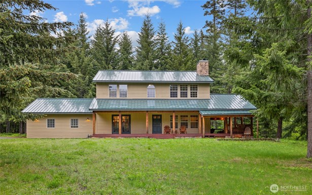Escape to tranquility on this breathtaking 5-acre retreat!