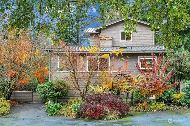 Beautiful home with mature foliage constantly changing year round