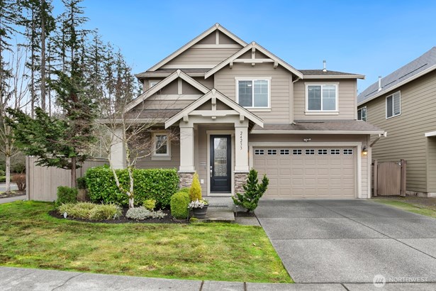 This stunning NORTH facing Craftsman-style 2-story home offers timeless charm with elegant column and stone accents.